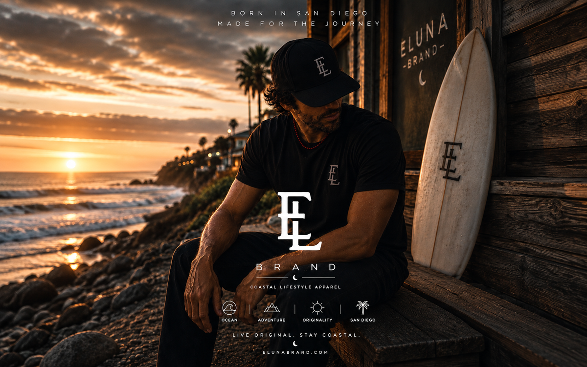 E Luna Brand coastal campaign with a man wearing an EL cap and shirt at sunset
